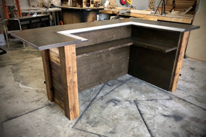 Rustic reclaimed plank goodtimes bar with foot and drink rail